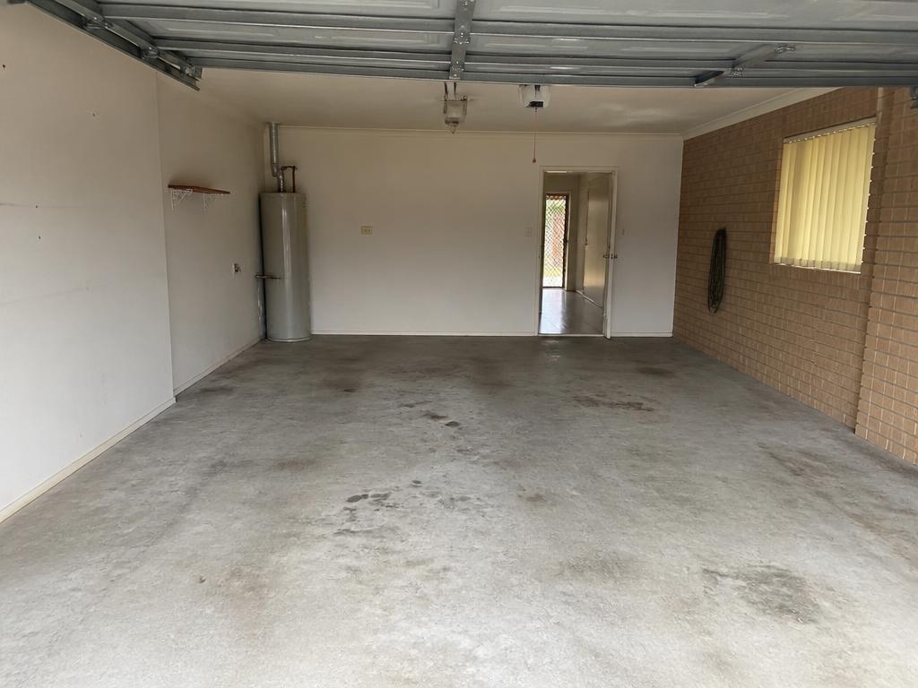 Garage before: plain bare concrete slab